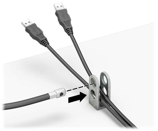 6. お使いの環境に適したネジを使用してオプションケーブルの固定具を机上に固定し ( ネジは付属していません )(1)