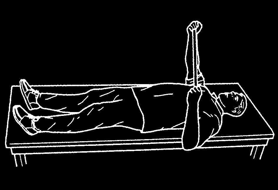 2 Lie on your back with your hands wrapped over the top of the dowel. Have one arm slightly out from your body with the elbow bent 90 degrees.